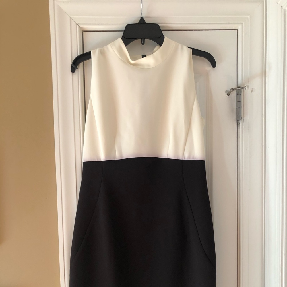 Dress with exposed zipper